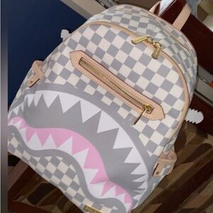 A sprayground vacay all day book bag